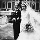 “English writer The Hon Nancy Mitford (1904 - 1973) and The Hon Peter Rodd (1904 - 1968) after their wedding at St John’s Church, Smith Square, London, 4th December 1933.” Photo via Getty Images.